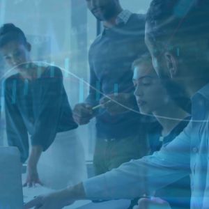 travel risk tabletop exercise: people working around a table, sharing insights and viewpoints